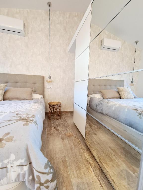 Postel nebo postele na pokoji v ubytování Atlantic Paradise