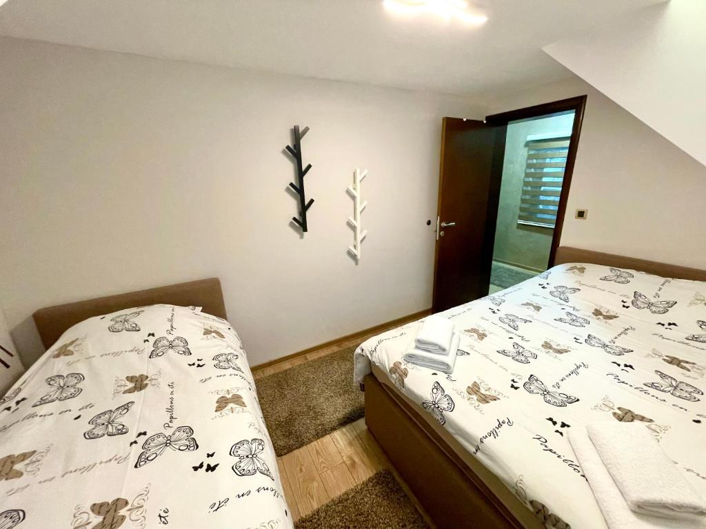 Voodi või voodid majutusasutuse Casa Nostra Kop toas