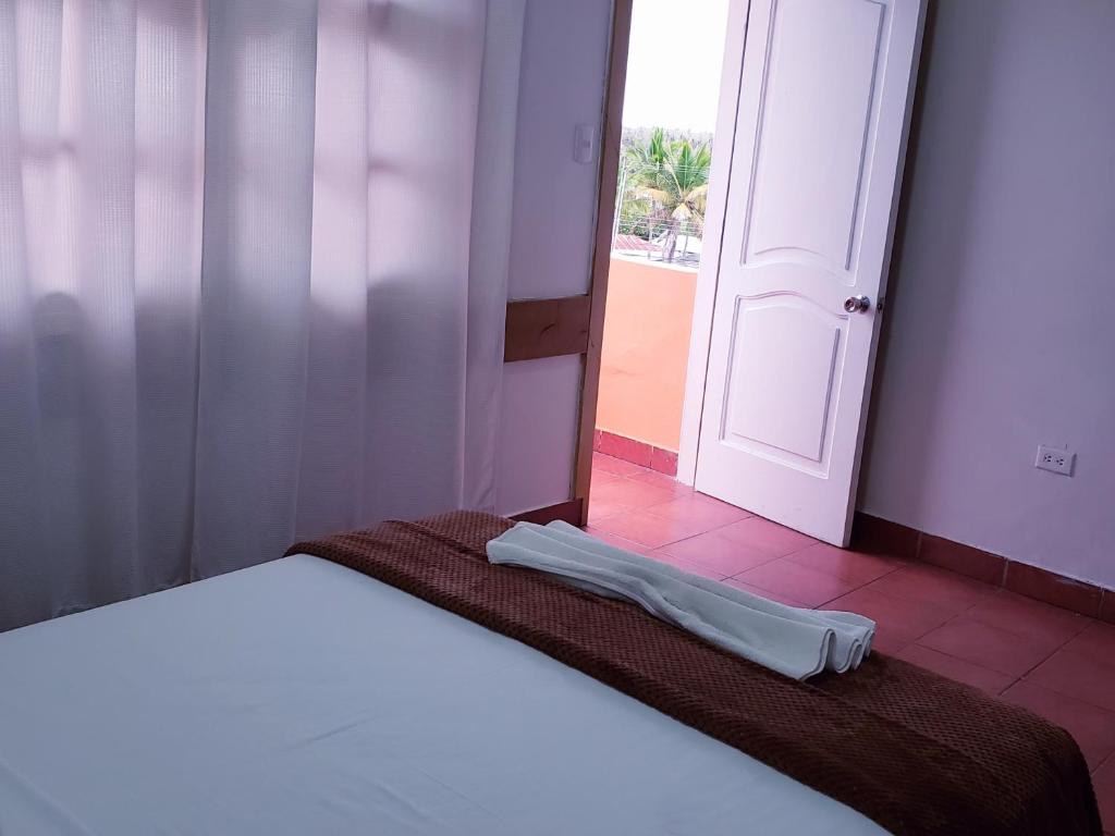 Postel nebo postele na pokoji v ubytování Hotel Crossman