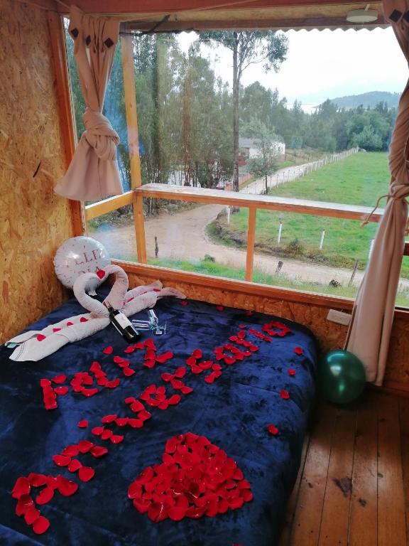 Letto o letti in una camera di Cabañas el mirador del tomine