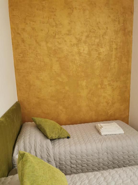 Postel nebo postele na pokoji v ubytování Ca Cristallina