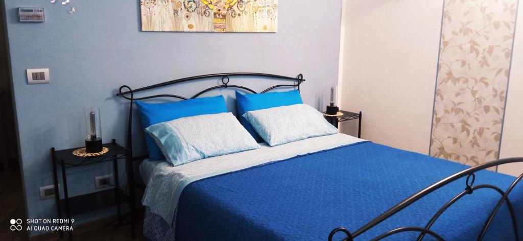 Postel nebo postele na pokoji v ubytování IL CORTILETTO 2