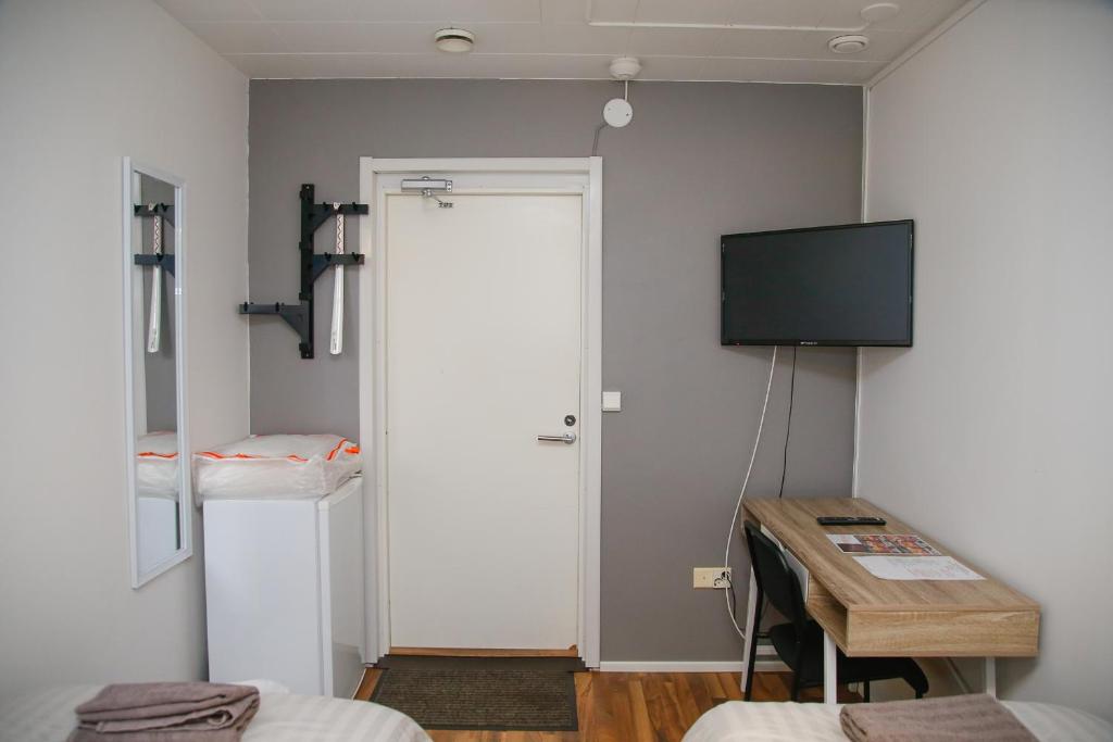 TV a/nebo společenská místnost v ubytování Motel Tornio