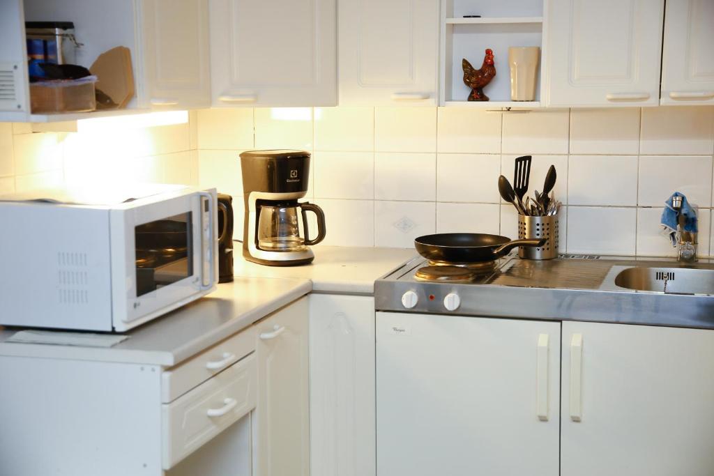 Kuchyň nebo kuchyňský kout v ubytování Motel Tornio