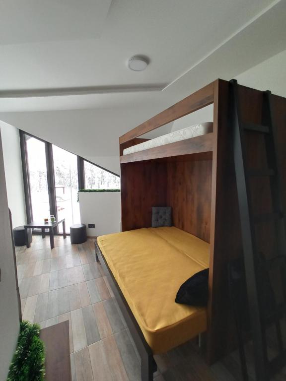 Postel nebo postele na pokoji v ubytování Apartman Studio LASTIN PUT Divčibare