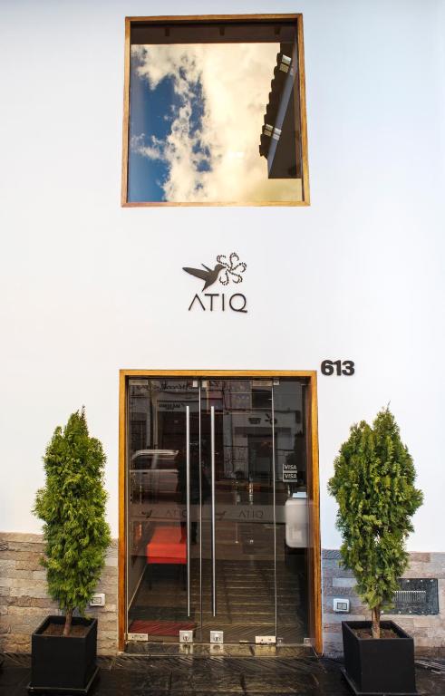 a entrance to a building with a glass door at Atiq Boutique Hotel in Cusco