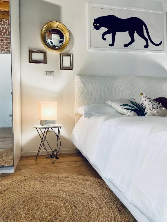 Łóżko lub łóżka w pokoju w obiekcie Ripa Apartments Milano - Ripa 57