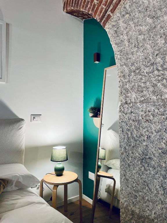 Łóżko lub łóżka w pokoju w obiekcie Ripa Apartments Milano - Ripa 57