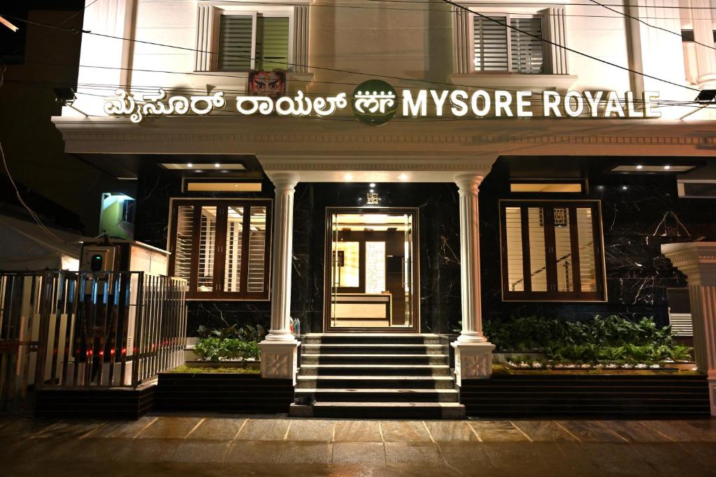 a building with the front door of a hotel at Mysore Royale in Mysore