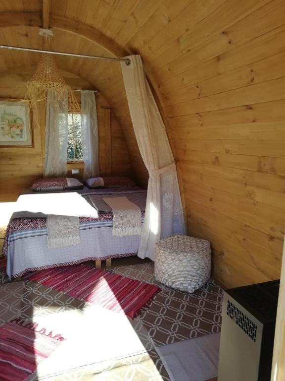 Postel nebo postele na pokoji v ubytování CASA LUCERTOLA