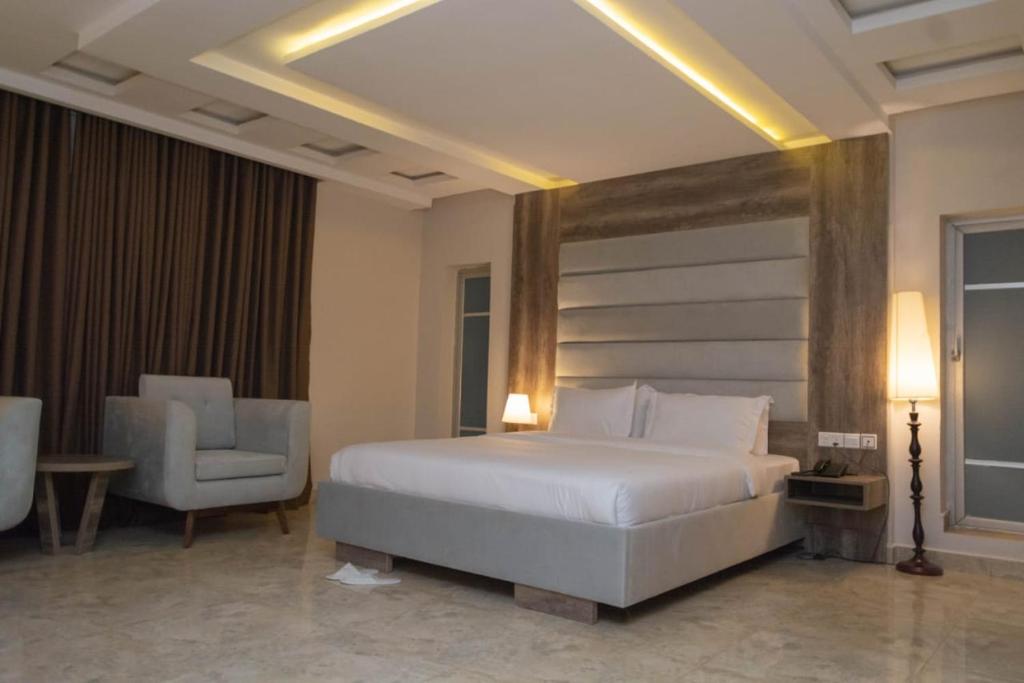 Postel nebo postele na pokoji v ubytování Le Masik Hotel