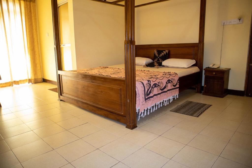 Postel nebo postele na pokoji v ubytování Chamaya Holiday Inn