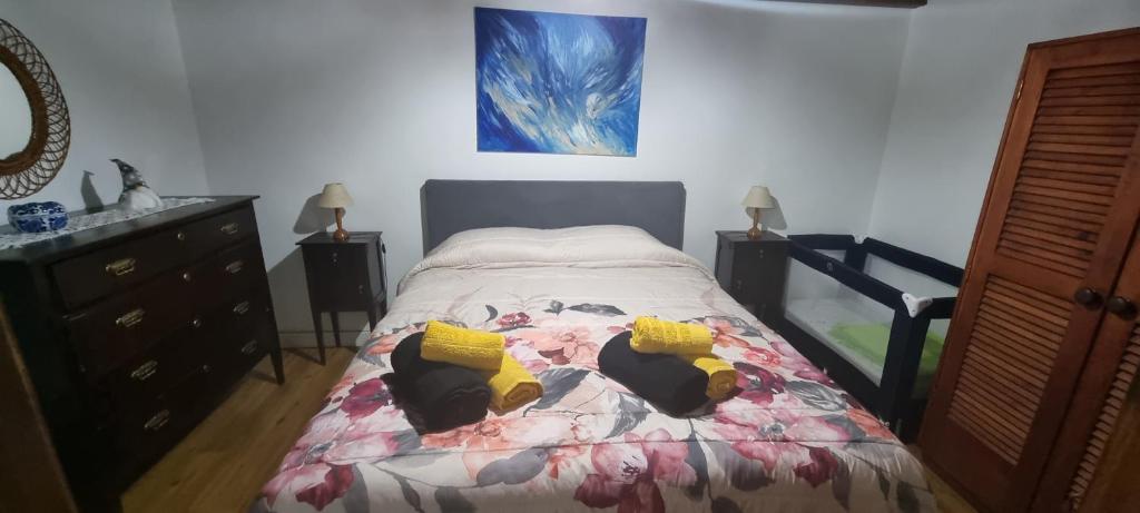 מיטה או מיטות בחדר ב-Casa do Sossego