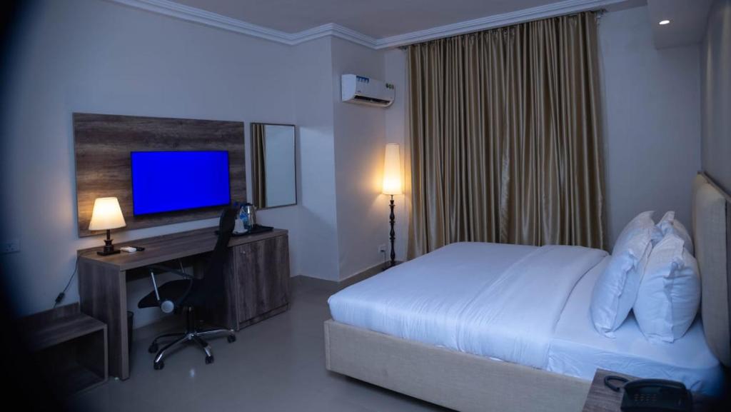Ένα ή περισσότερα κρεβάτια σε δωμάτιο στο Le Masik Hotel