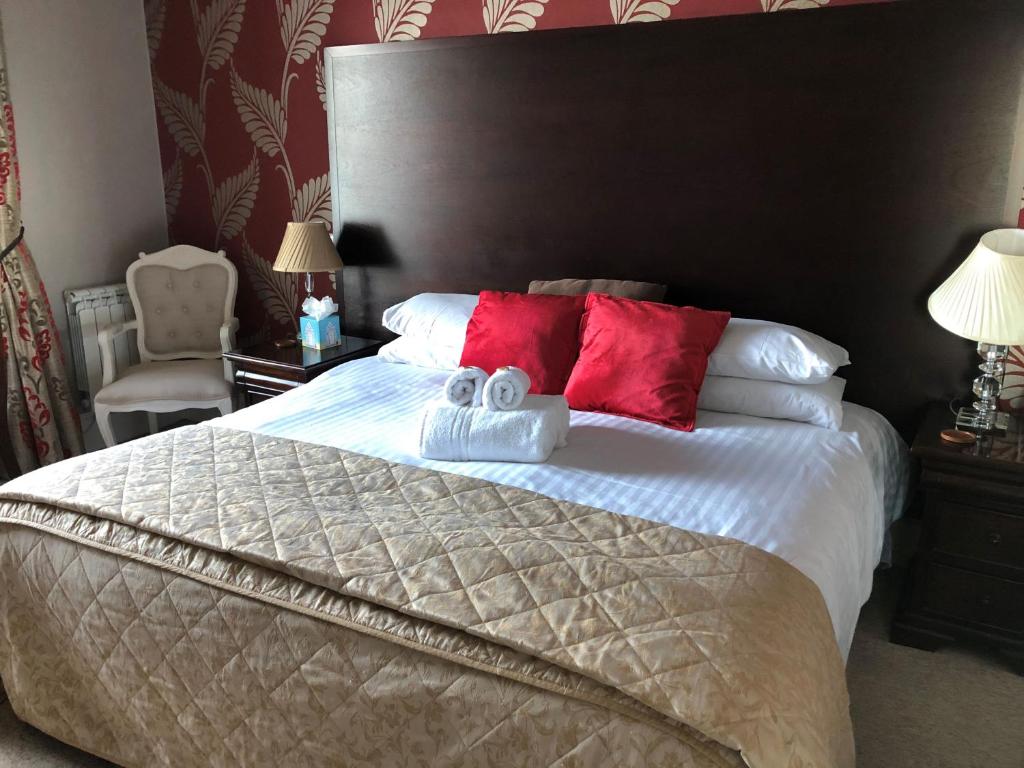 Postel nebo postele na pokoji v ubytování Seawood House Boutique Hotel