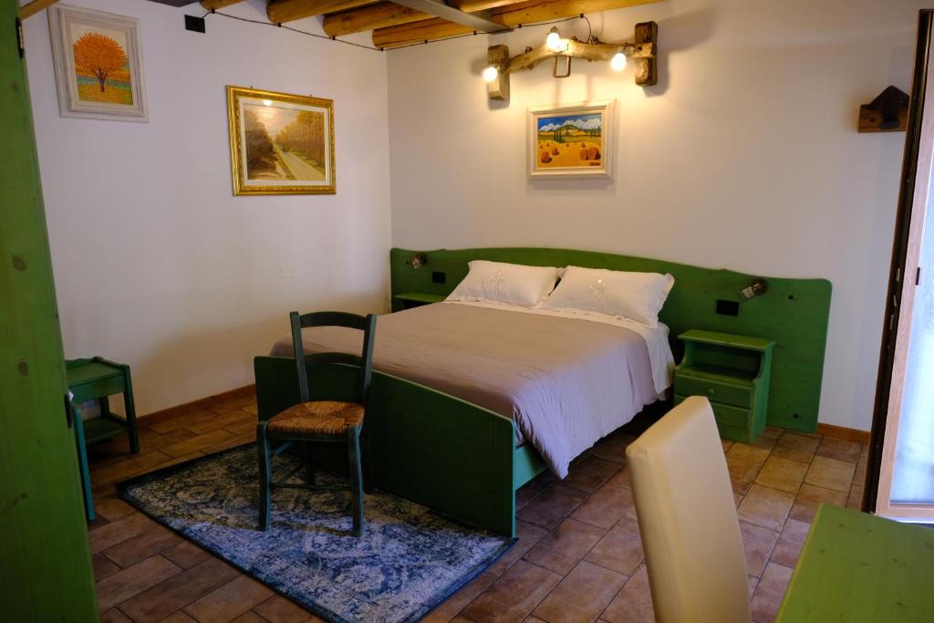 Postel nebo postele na pokoji v ubytování BB IL CIPPO