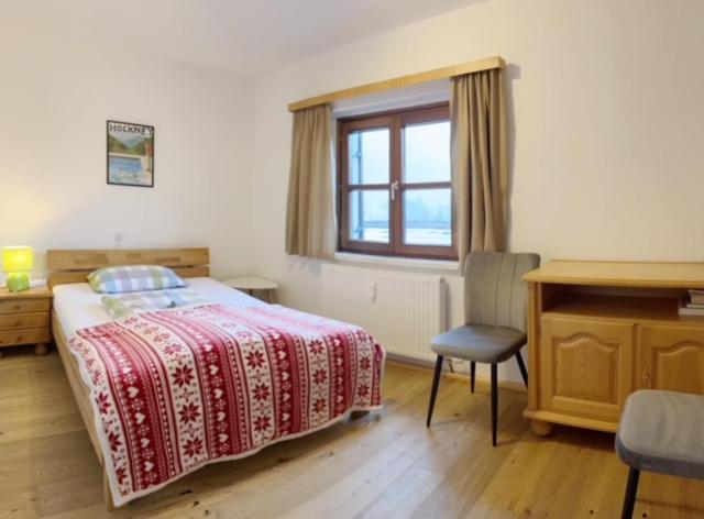 Postel nebo postele na pokoji v ubytování Apartment Sophia - Hallstatt