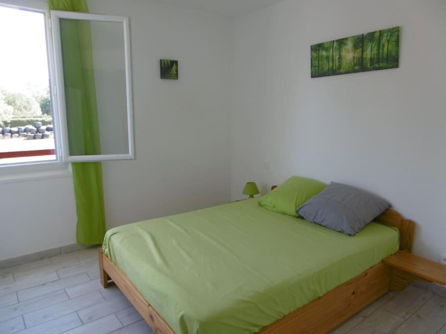 Postel nebo postele na pokoji v ubytování baratzean