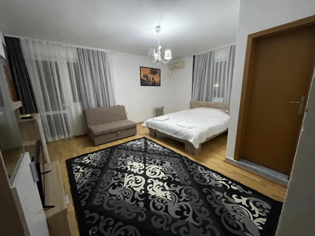 Postel nebo postele na pokoji v ubytování Apartments Dibra