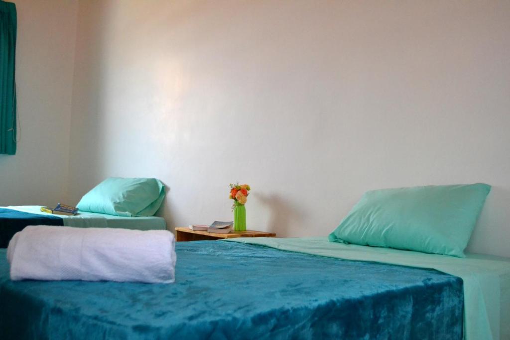 Postel nebo postele na pokoji v ubytování Econunay Hostels