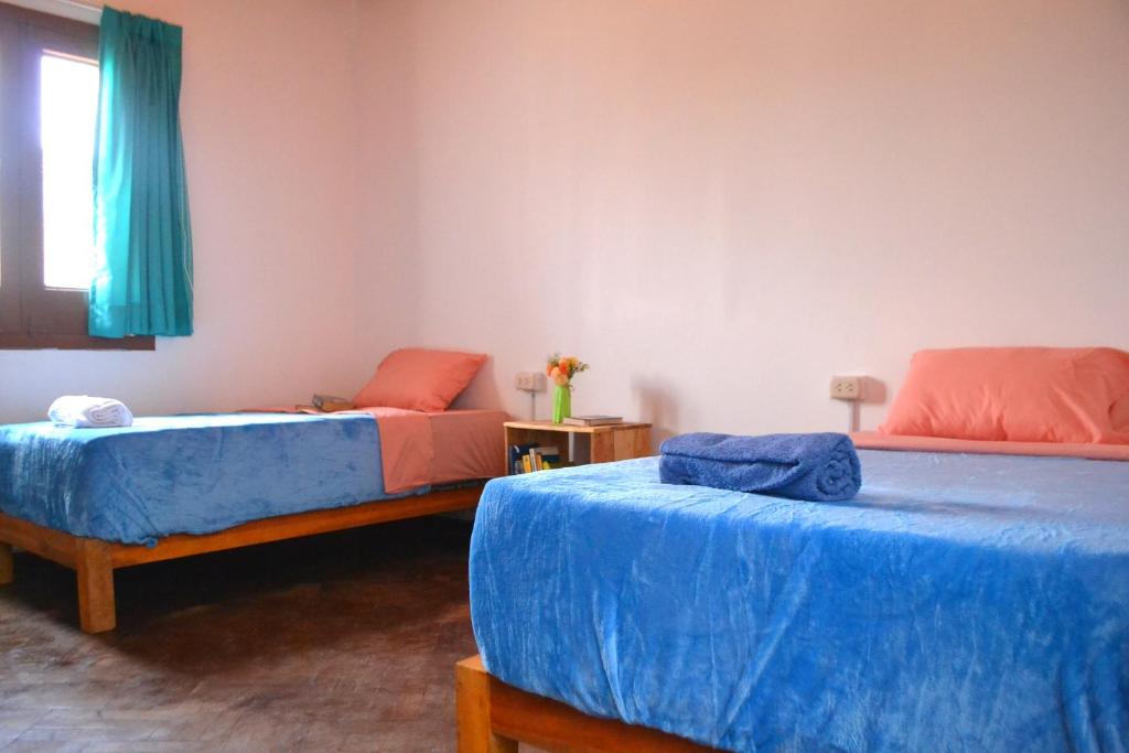 Postel nebo postele na pokoji v ubytování Econunay Hostels