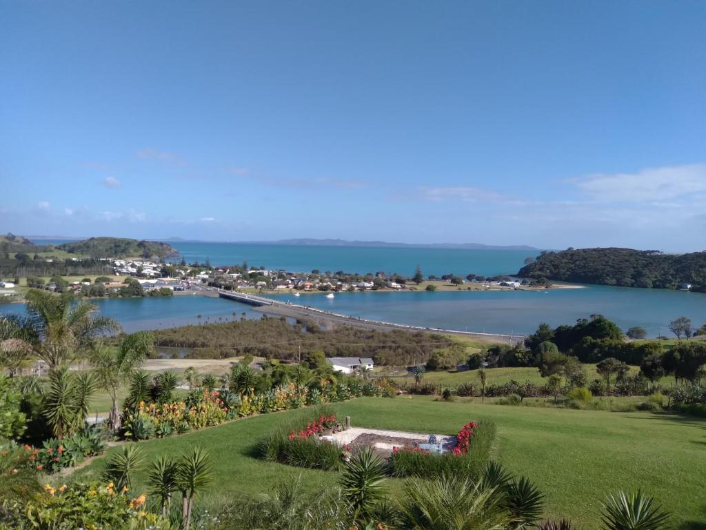 an aerial view of a park with a body of water at Taipa Coastal Retreat in Taipa
