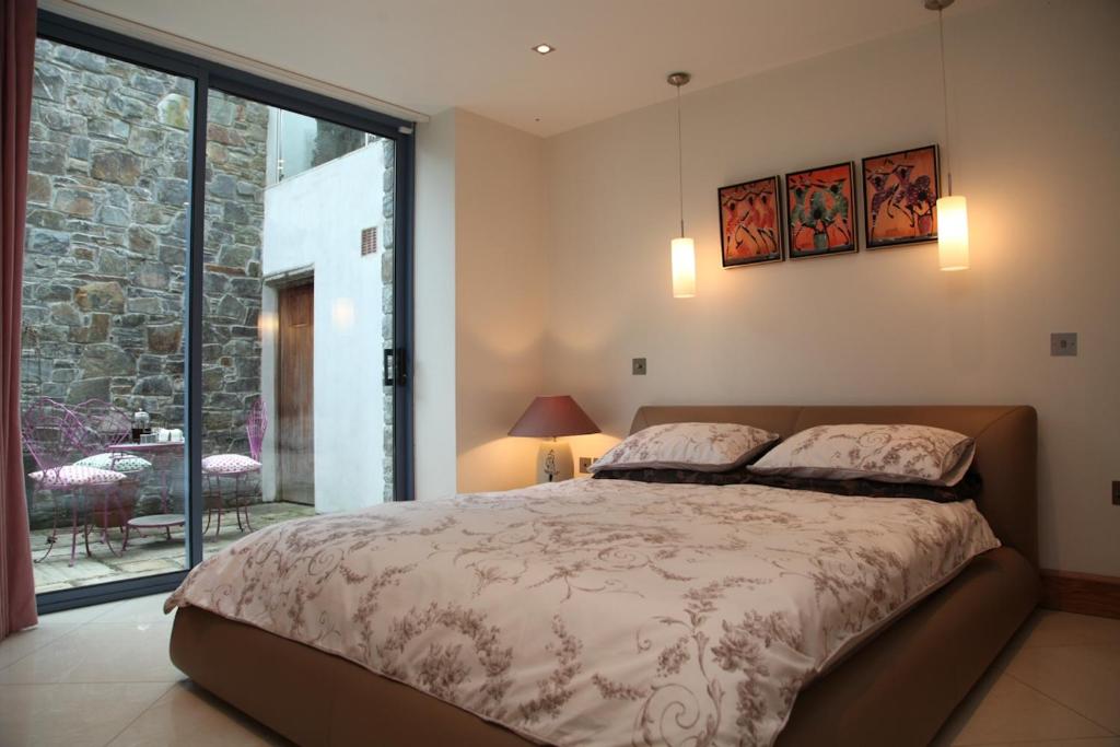 Un pat sau paturi într-o cameră la Limehill
