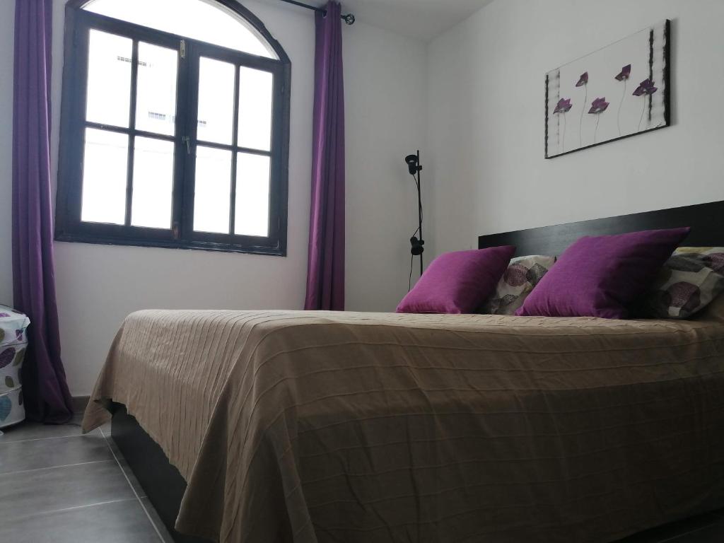 A bed or beds in a room at Amazing View Holiday Home near of the sea