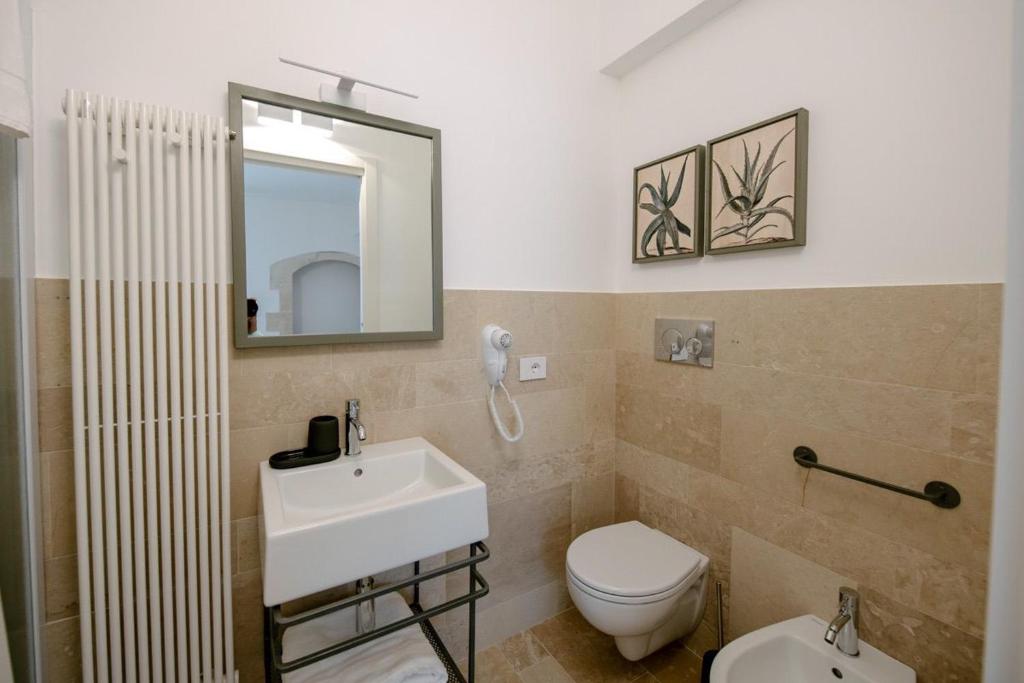 Koupelna v ubytování IBLA ROOMS