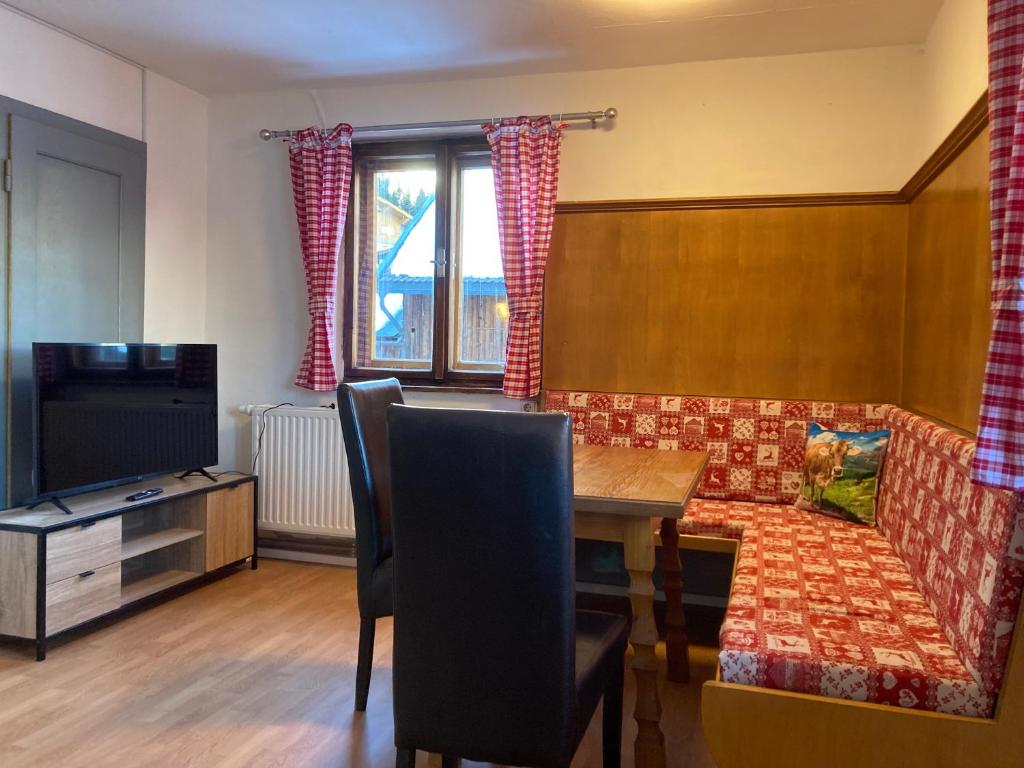 TV a/nebo společenská místnost v ubytování Bären Appartements