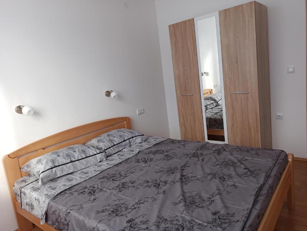 Postel nebo postele na pokoji v ubytování Vila Ljuti krš