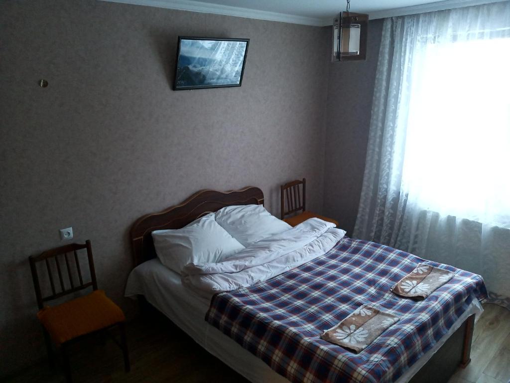 Postel nebo postele na pokoji v ubytování Guest House Sunset