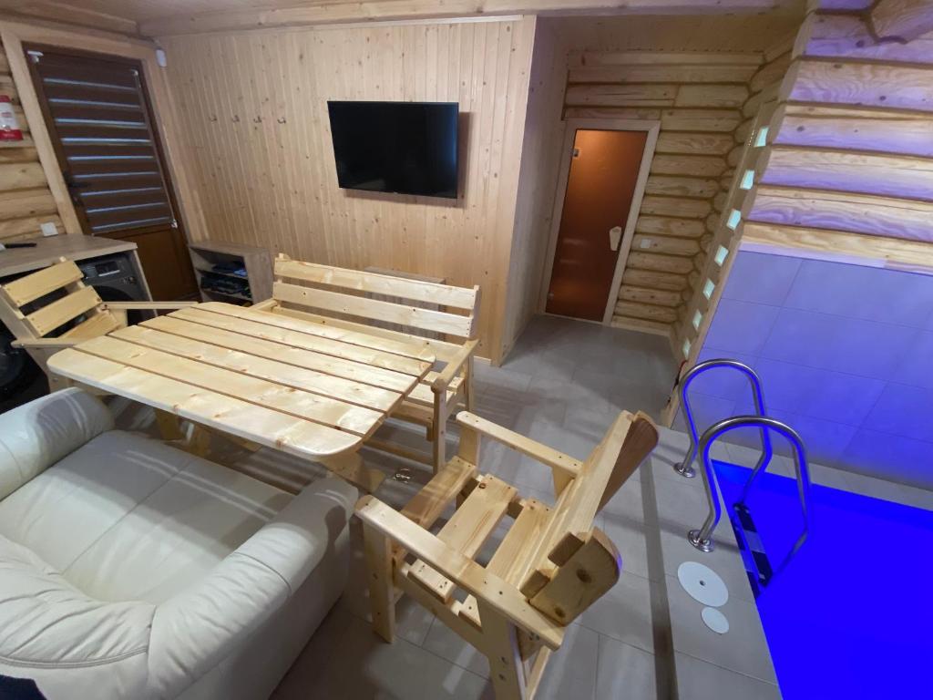 TV a/nebo společenská místnost v ubytování Zorianyy Guest House