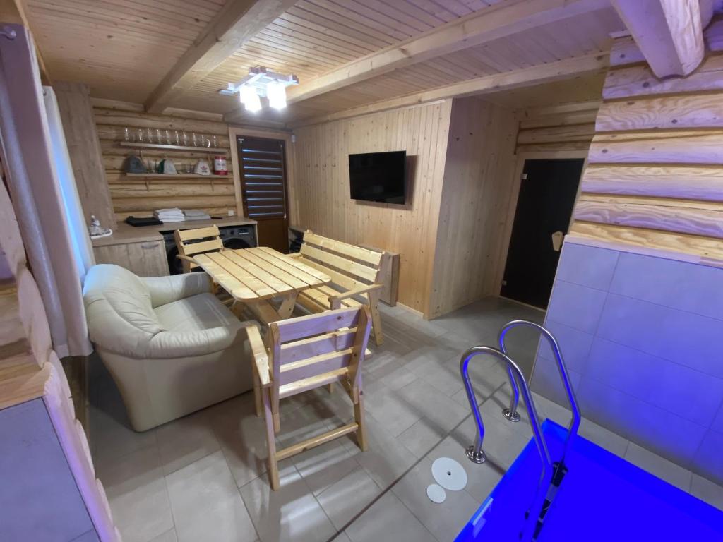 TV a/nebo společenská místnost v ubytování Zorianyy Guest House