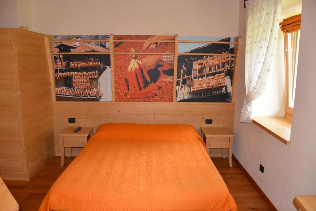 Postel nebo postele na pokoji v ubytování Agritur La Polentera
