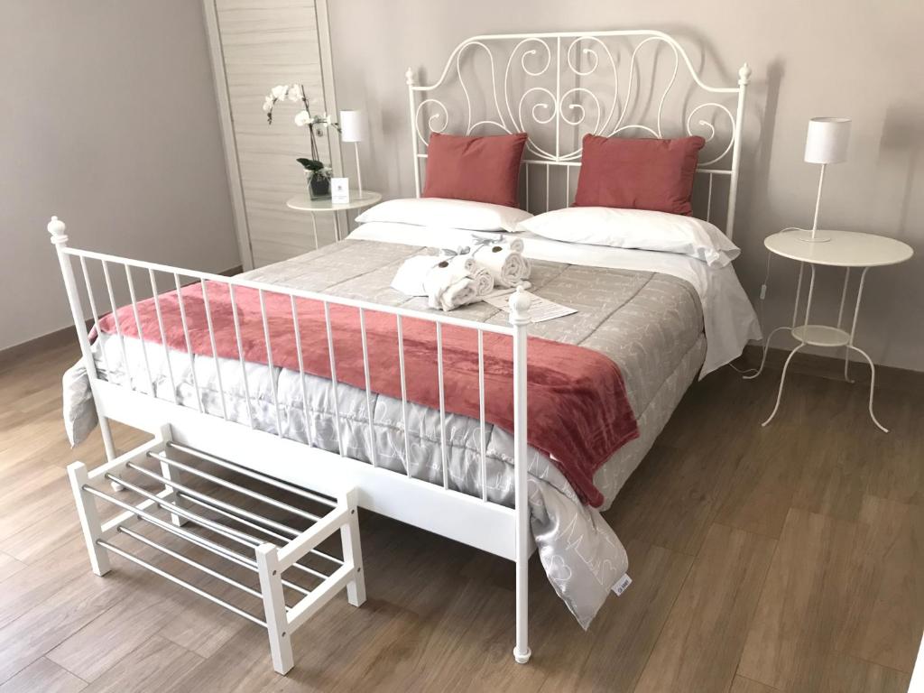 Posteľ alebo postele v izbe v ubytovaní Il Tempio di Athena - Cultura e Relax a Siracusa