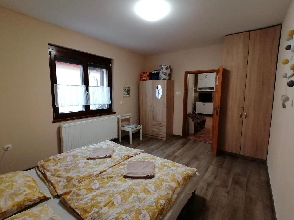 Posteľ alebo postele v izbe v ubytovaní Carolina Vendégház