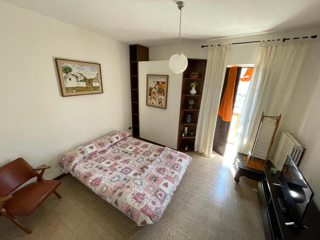 A bed or beds in a room at Casa Jolanda
