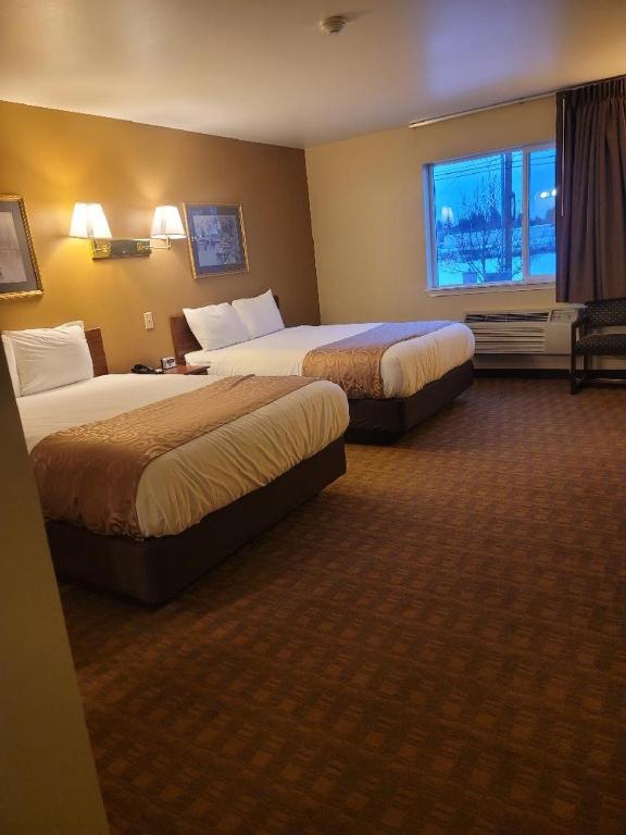 GuestHouse Montesano - Standaard 2 Queensize Bedden