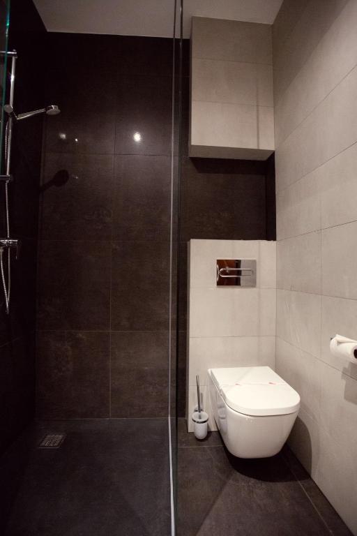 Kúpeľňa v ubytovaní Kompleks Dąbrówka
