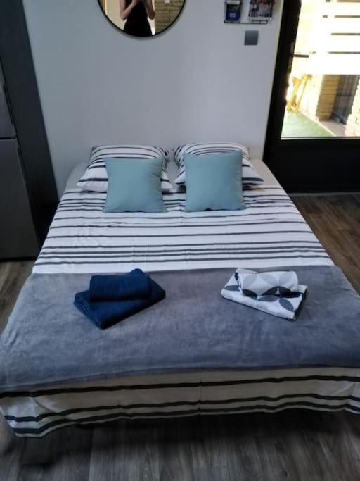 Letto o letti in una camera di L'Oustal