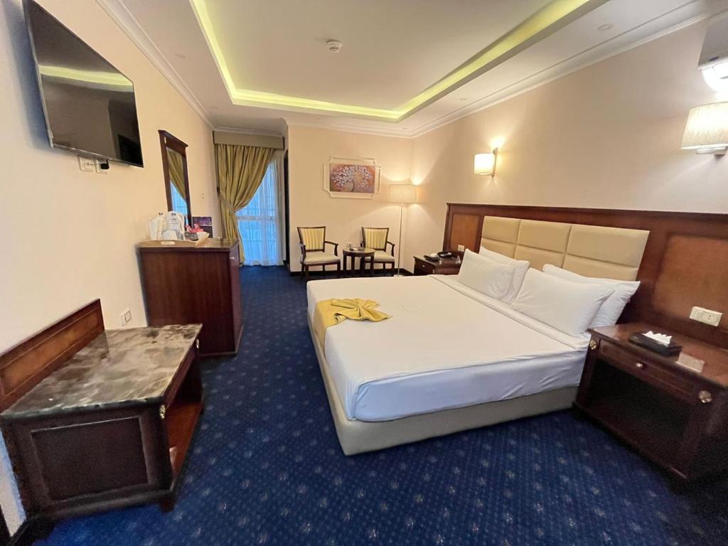Moon Light Hotel Cairo DAR EL ESHARAにあるベッド