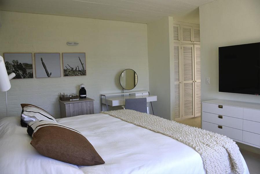 Postel nebo postele na pokoji v ubytování Posada Tamarindo