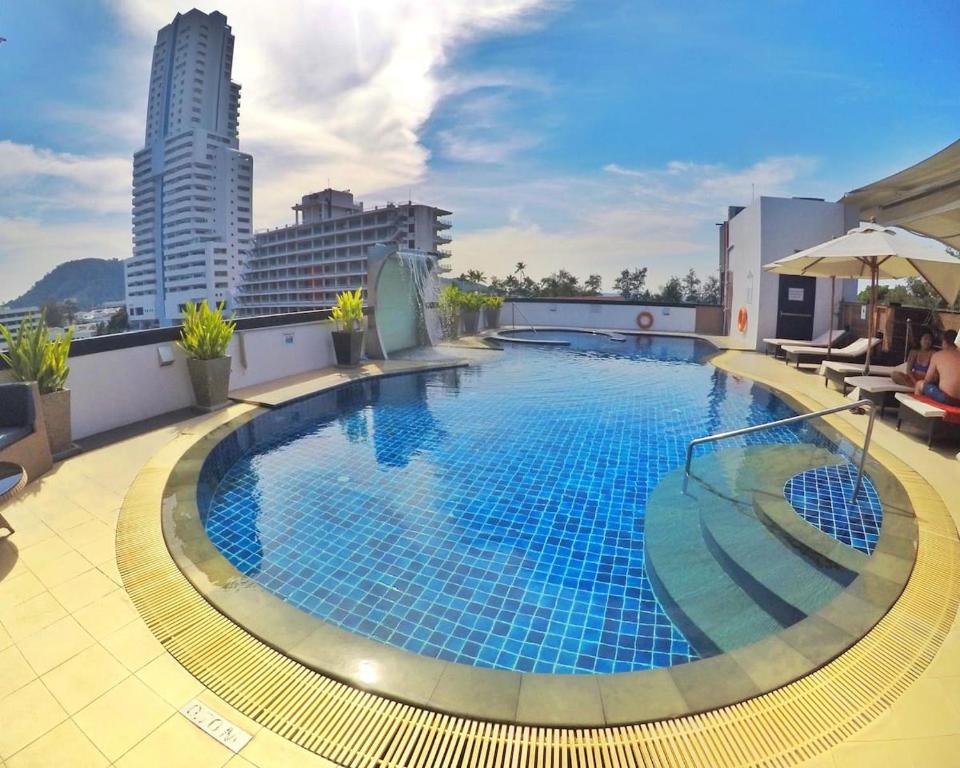 a large swimming pool on the roof of a building at Best 2 bedroom Apartment 2min walk to Patong Beach in Patong Beach