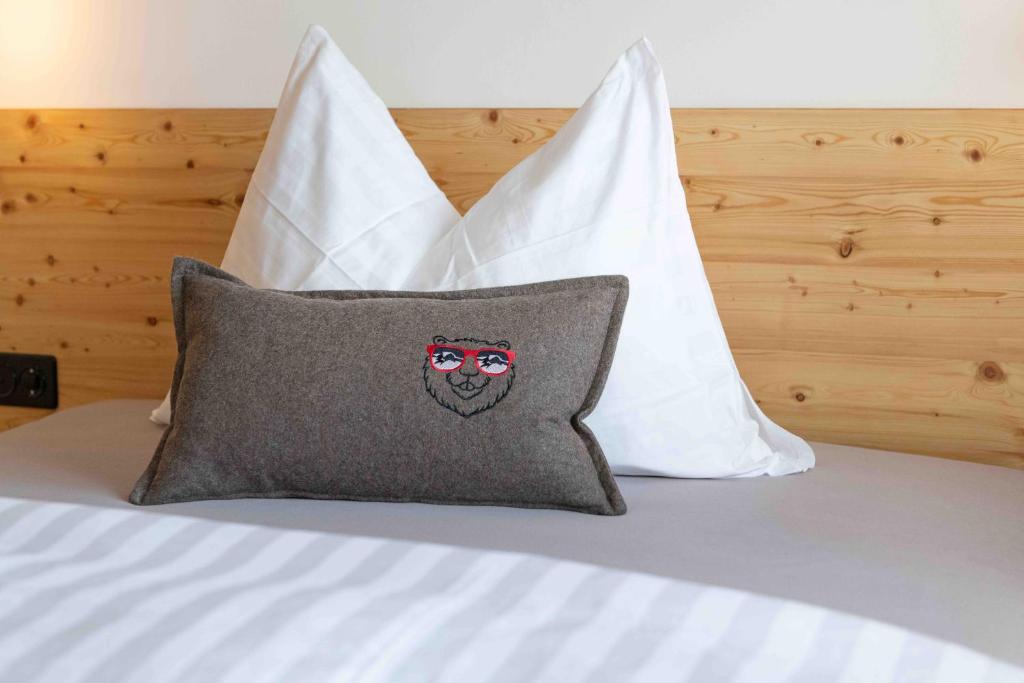 Postel nebo postele na pokoji v ubytování Hotel Tödiblick