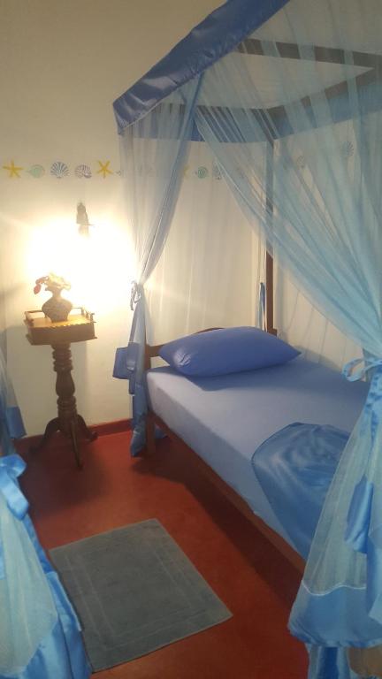 Postel nebo postele na pokoji v ubytování Gasthaus Langeoog