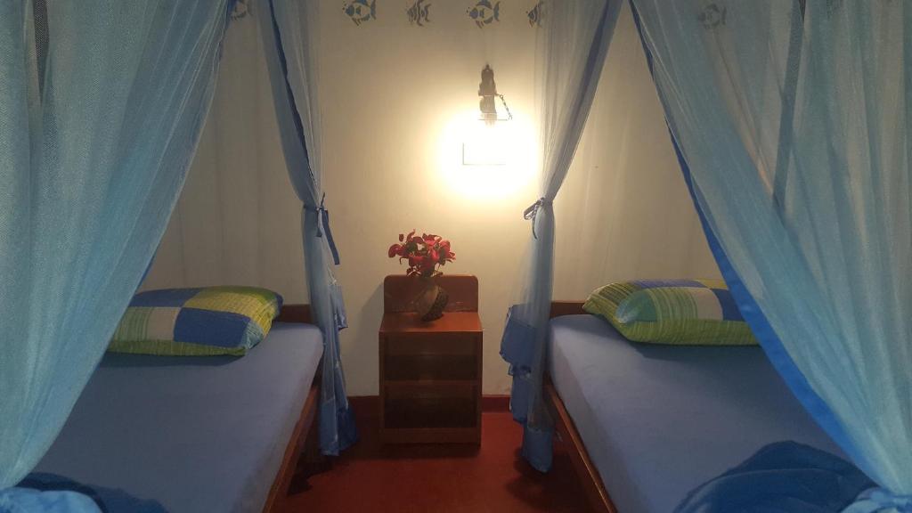 Postel nebo postele na pokoji v ubytování Gasthaus Langeoog