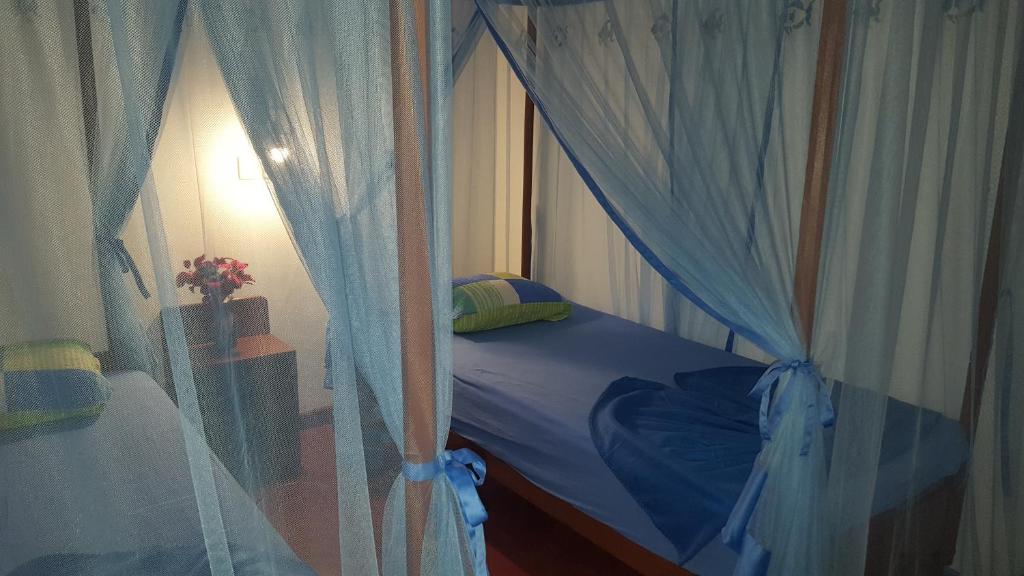 Postel nebo postele na pokoji v ubytování Gasthaus Langeoog