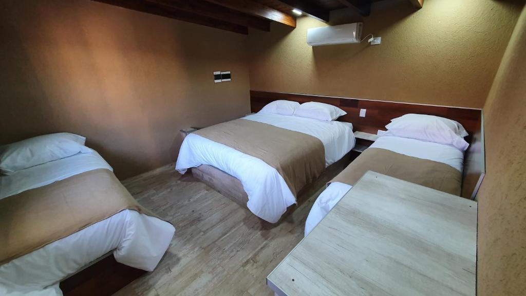 Postel nebo postele na pokoji v ubytování Los 4 elementos