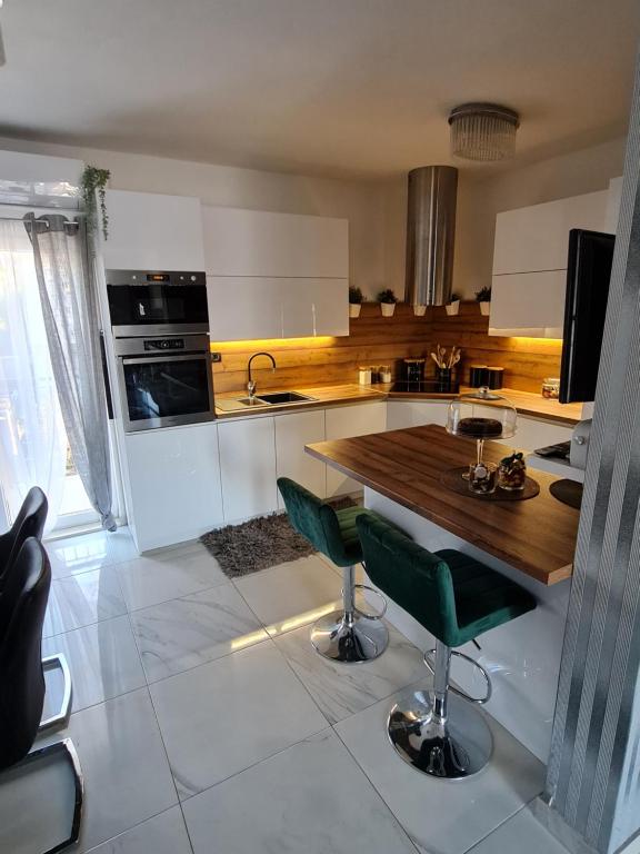 Kuchyňa alebo kuchynka v ubytovaní Luxury Apartments Mia